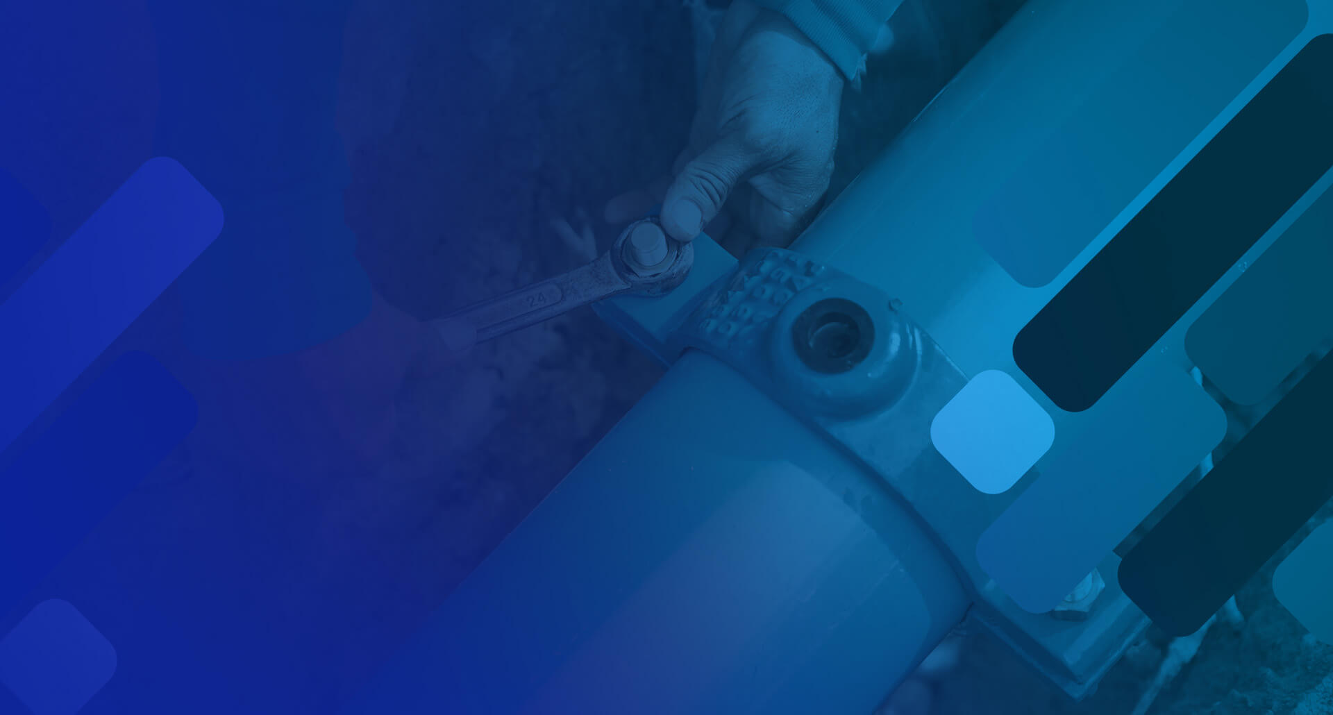 tightening a bolt on a pipe