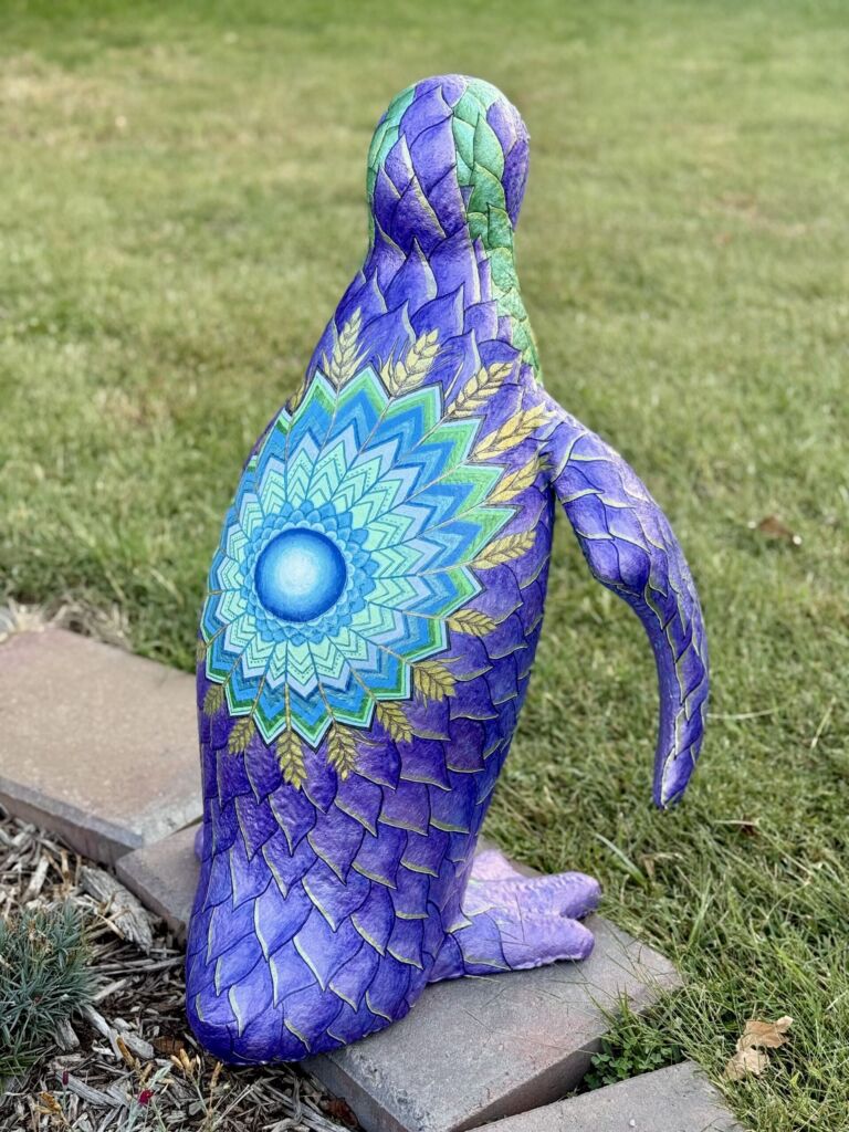 A colorful penguin sculpture.