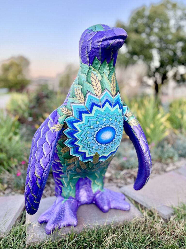 A colorful penguin sculpture.