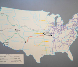 A historical map of the United States highlighting trails and railroad routes in 1860. Notable paths include the Santa Fe Trail, Mormon Trail, and Oregon Trail, among others. The map also marks locations such as San Francisco, Salt Lake City, and St. Louis, and outlines regions like Nebraska Territory and Indian Territory.