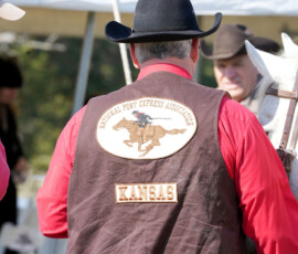 Detail of rider's National Pony Express Association vest.