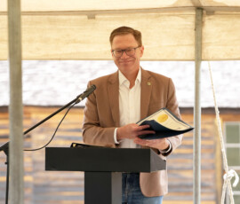 Lt. Governor David Toland hold the proclamation affirming the Pony Express Byway.