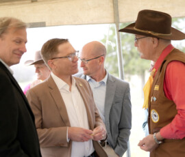 Lt. Governor David Toland chats with a Pony Express rider.