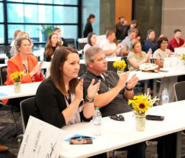 Individuals at the HEAL 6.0 award presentation.