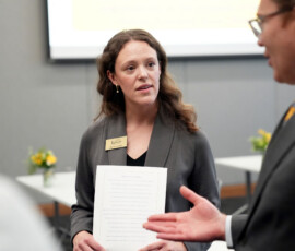 Individuals at the HEAL 6.0 award presentation.